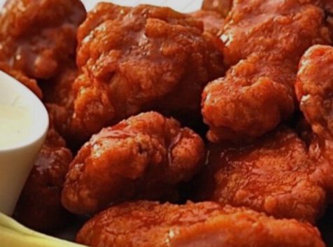 a close up of a plate of food with chicken.