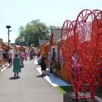 A red heart shaped sculpture.