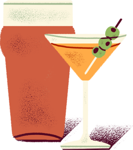 A martini glass with olives and a bottle.