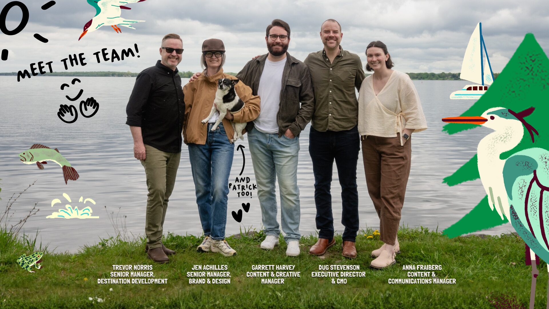 Image of five people standing on grass in front of a body of water