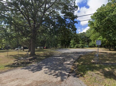 Image of a park with trees and grass