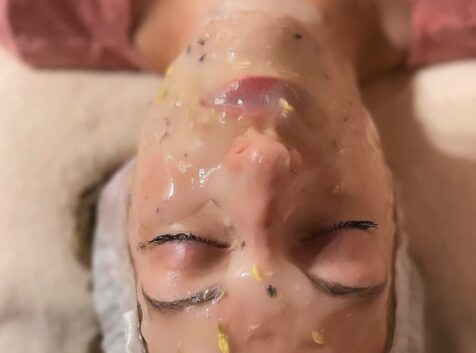Image of a person at the spa having a facial treatment