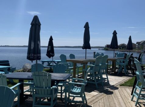Image of a restaurant with patio on the water