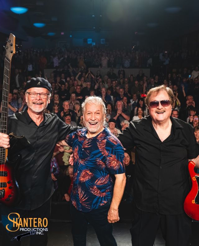 3 men on stage